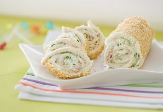 foto da receita Rocambole de arroz com peito de peru e queijo