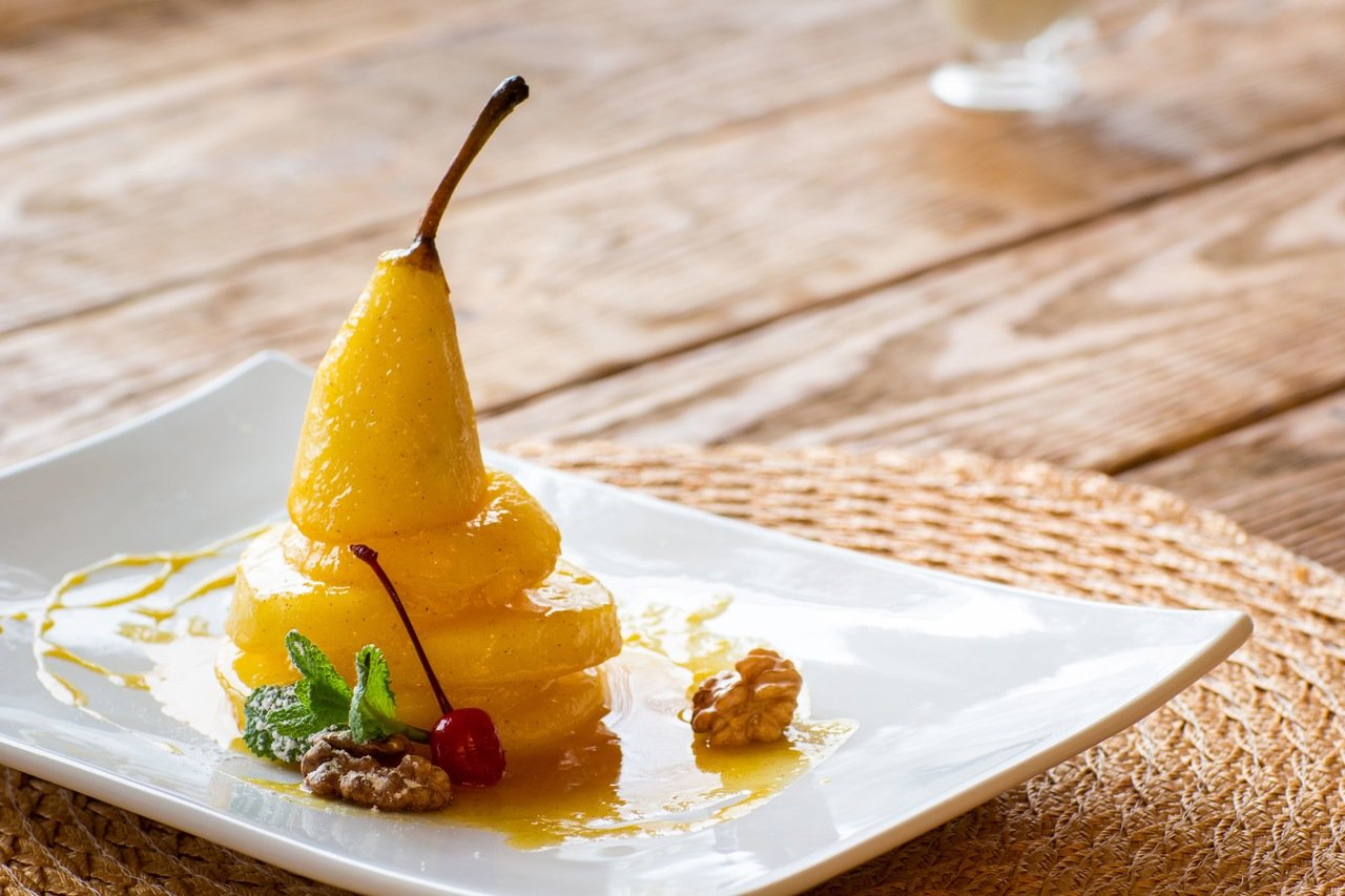 foto da receita Pêra cozida em suco de uva branca